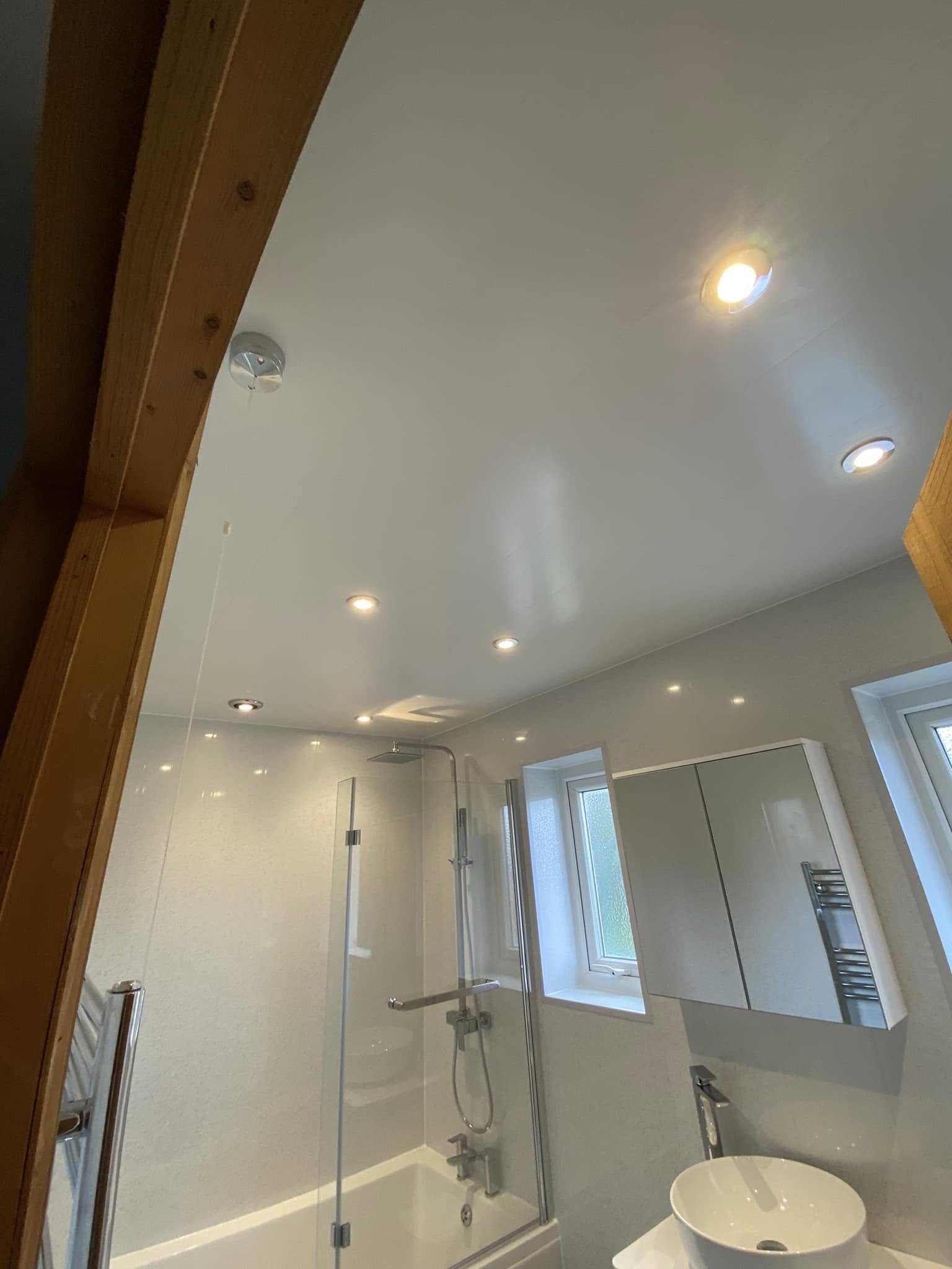 Downlights over a bath and shower
